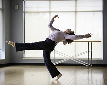 Student dances in a studio